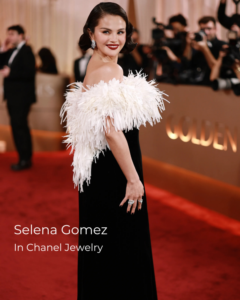 Selena Gomez at the Golden Globes 2026 wearing Chanel high jewelry diamond earrings and rings, reflecting classic red carpet jewelry elegance.