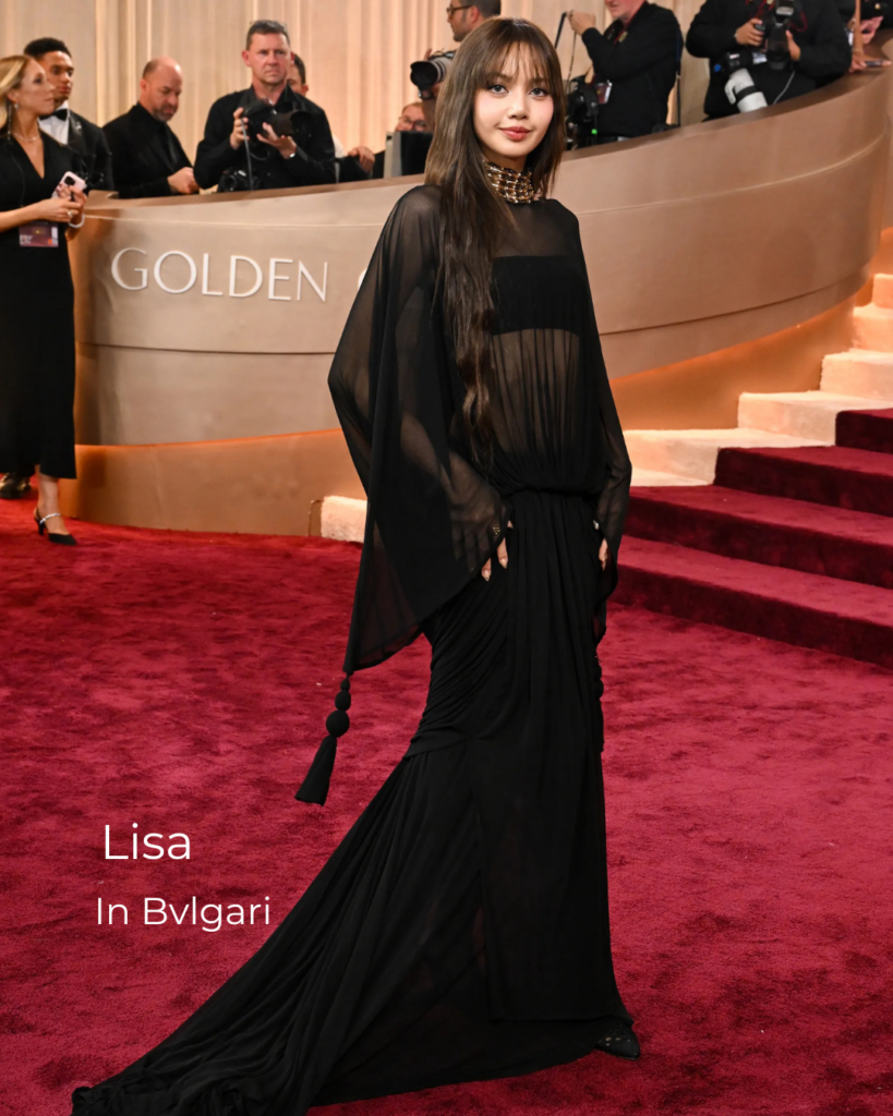 Lisa at the Golden Globes 2026 wearing a Bulgari high jewelry necklace, featuring bold couture gemstone design and luxury celebrity jewelry styling.