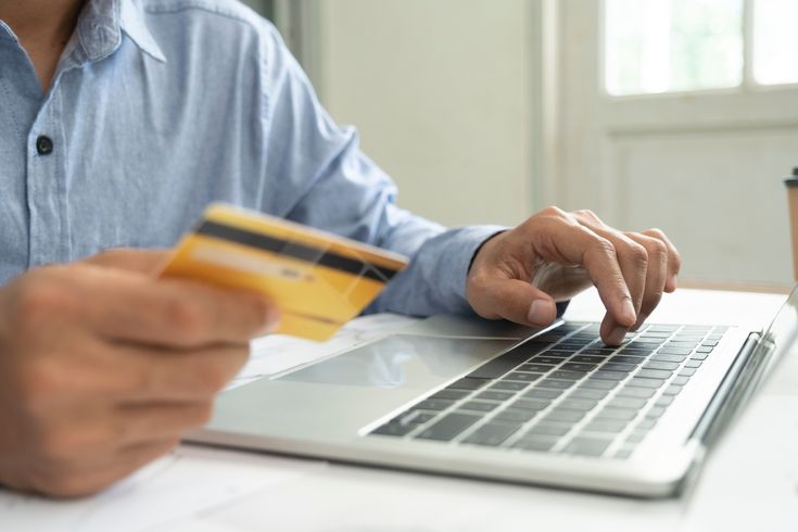 Man shopping for engagement rings online, reflecting growing digital demand for men’s engagement rings.