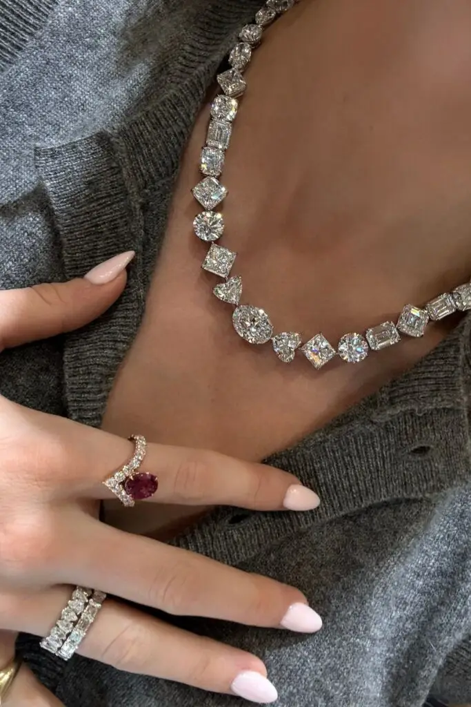 Imitation diamond necklace and rings prototype used to visualize fine jewelry design, showcasing stone placement, proportions, and luxury jewelry styling before final gold and diamond production.

