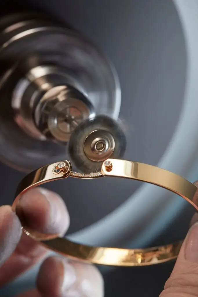 Fine jewelry finishing process after imitation jewelry testing, showing how designers refine bracelets before mass production
