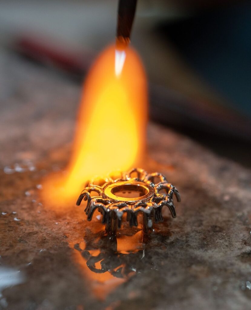 Lost-wax casting process turning a wax ring model into gold during custom jewelry manufacturing workflow – The Jewelry Gossi