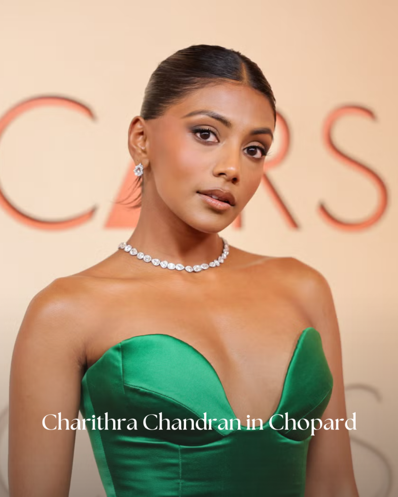 Charithra Chandran in Chopard diamond jewelry at Oscars 2026 wearing elegant necklace and matching earrings