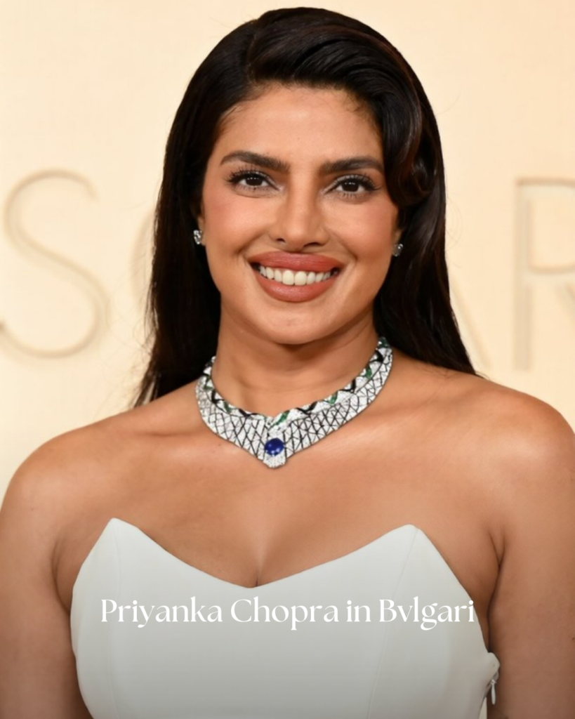 Priyanka Chopra wearing Bvlgari jewelry at Oscars 2026 featuring diamonds with colored gemstones on the red carpet