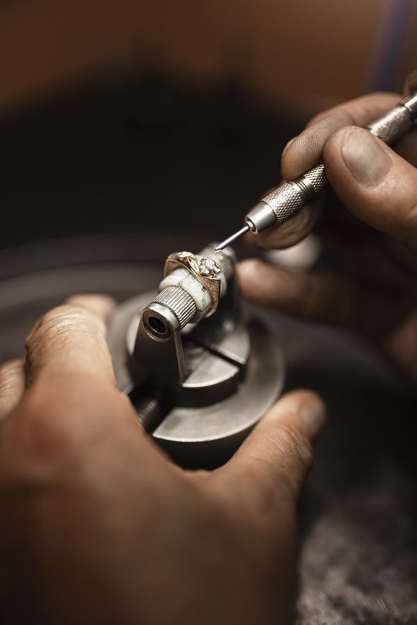 Final polishing and finishing of a diamond ring highlighting the last stage of custom jewelry manufacturing and made-to-order jewelry craftsmanship – The Jewelry Gossip