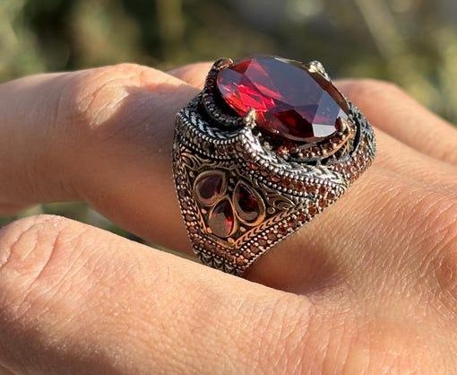 Deep red garnet gemstone for January birthstone in fine jewelry, symbolizing protection and strength