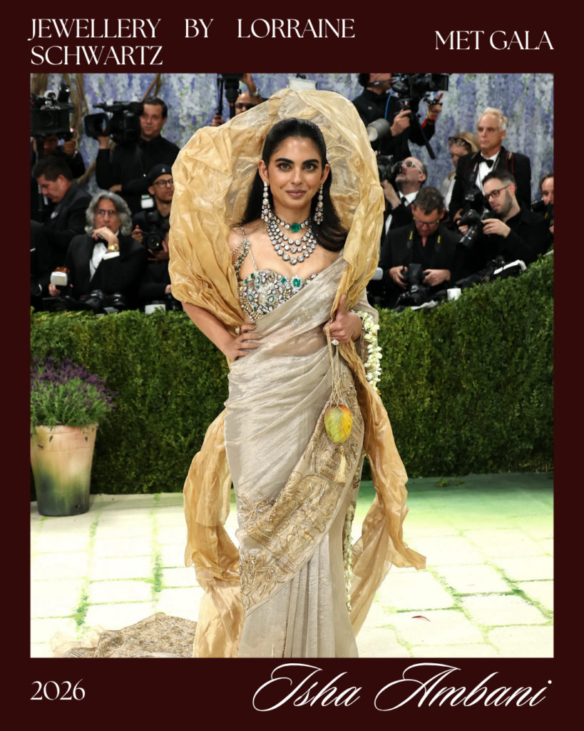  Isha Ambani Met Gala look 2026 wearing Gaurav Gupta couture sari with 1800 carat heirloom diamond and emerald jewelry zardozi embroidery Costume Art red carpet
