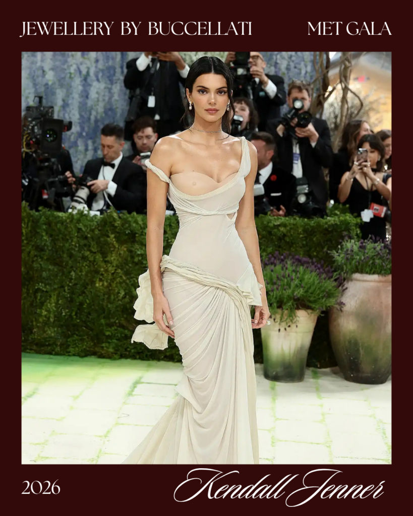 Kendall Jenner Met Gala look 2026 wearing Buccellati pearl gold earrings rings GapStudio Zac Posen ivory Winged Victory of Samothrace inspired gown Costume Art red carpet
