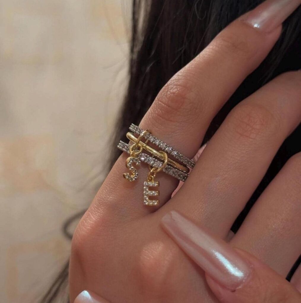 Personalized fine jewelry featuring engraved pendants, birthstones, initials, and custom-made luxury jewelry designs.