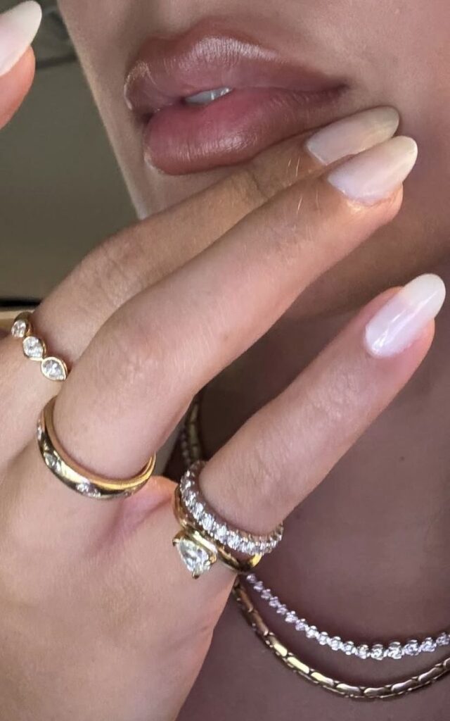 2027 jewelry trends featuring modern heirloom jewelry, yellow gold pieces, colored gemstones, statement accessories, and personalized luxury designs.